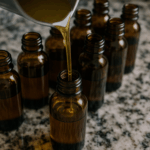 Handcrafted beard oil in smoked brown glass bottles, lined up for small batch production on a rustic countertop.